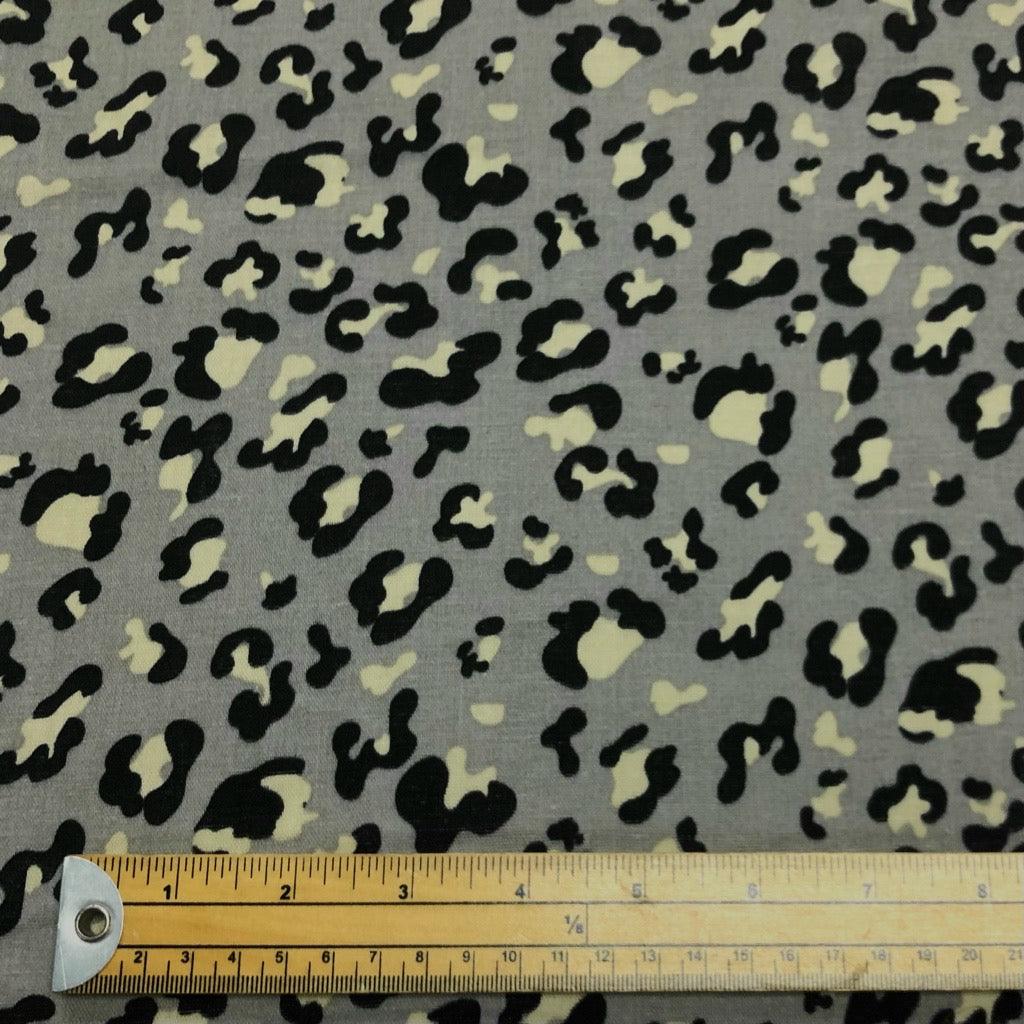 Panther on Taupe Flat Double Gauze Fabric- SECONDS - Pound Fabrics