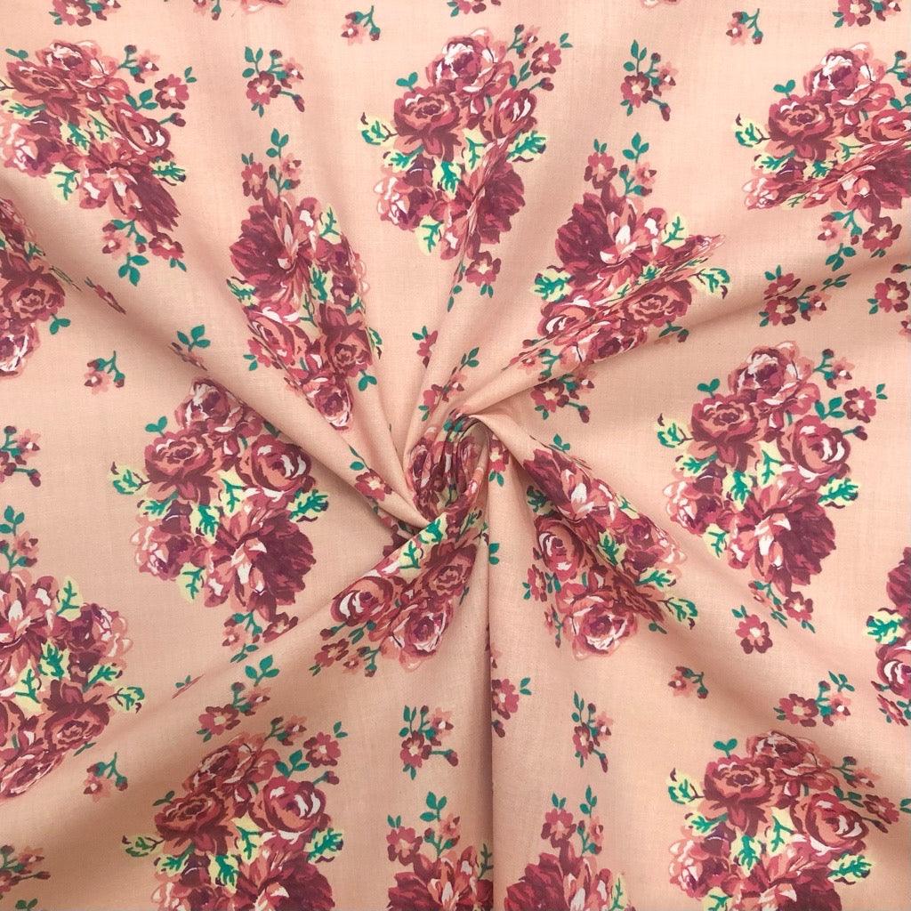 Rose Bouquets on Peach Polycotton Fabric - Pound Fabrics
