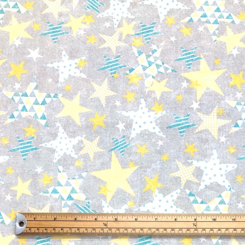 White/Yellow/Blue Stars on Grey Cotton Fabric - Pound Fabrics