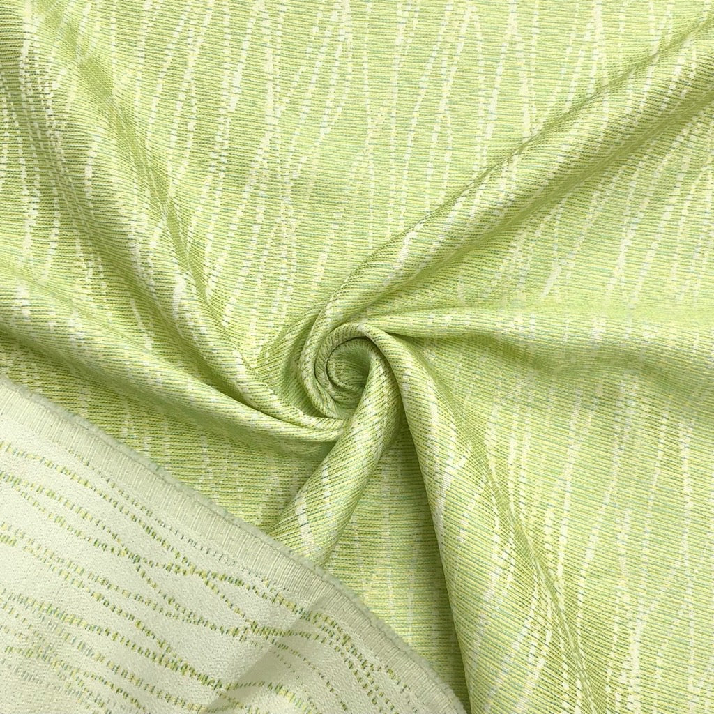 Messy Lines on Green Furnishing Fabric