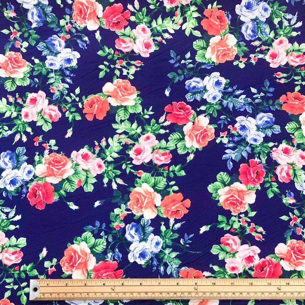Red/Orange/Blue Floral on Navy Elastane Fabric - Pound Fabrics