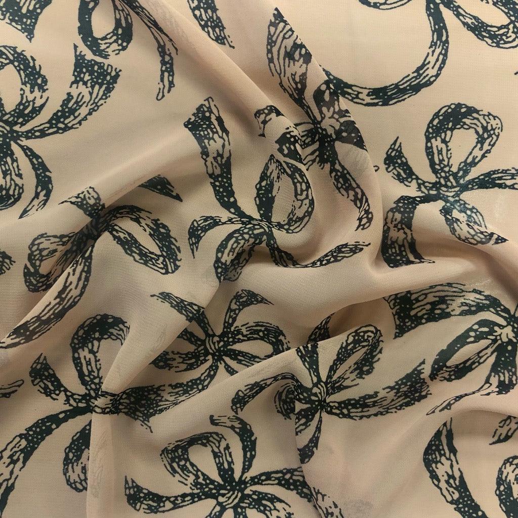 Large Black Ribbons on Beige Chiffon Fabric - 3 metres for £3 - Pound Fabrics