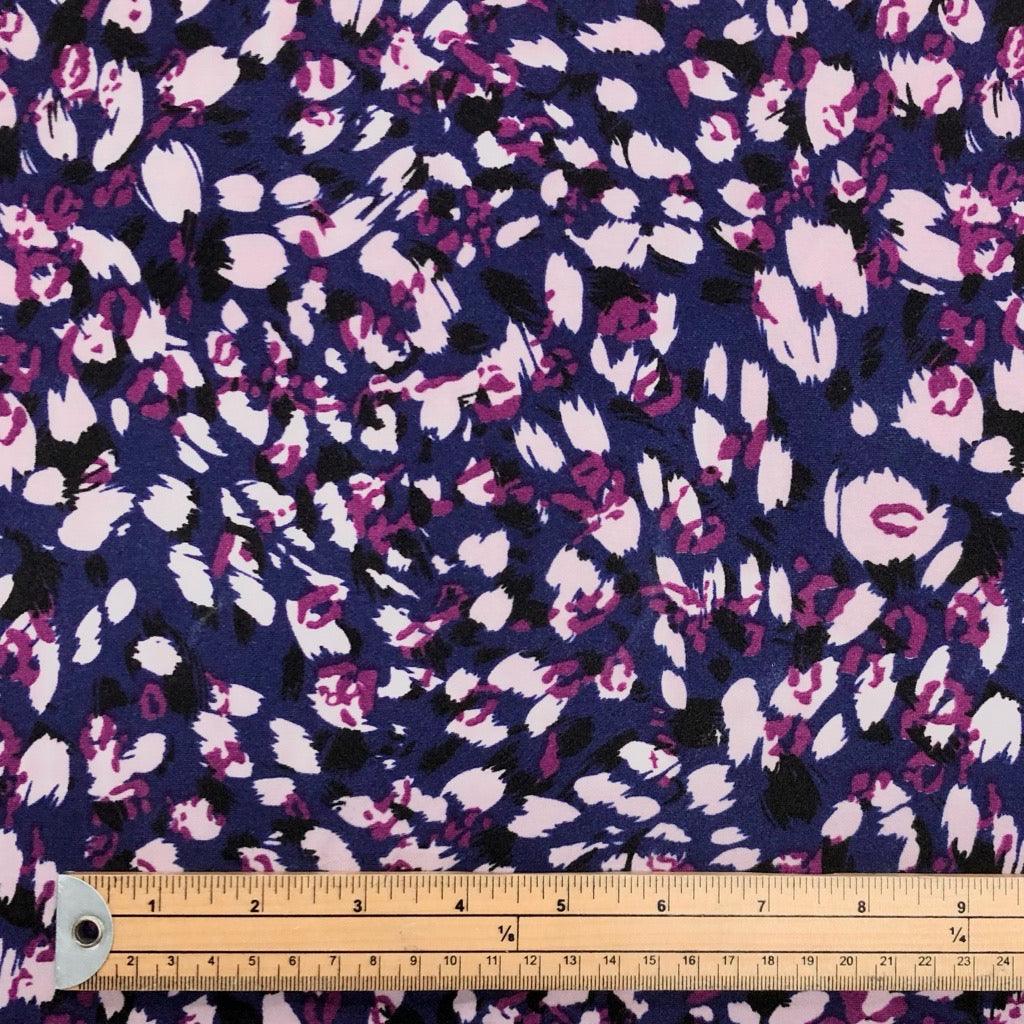 Pink and Black Patterns on Navy Brushed Soft Jersey Fabric - Pound Fabrics