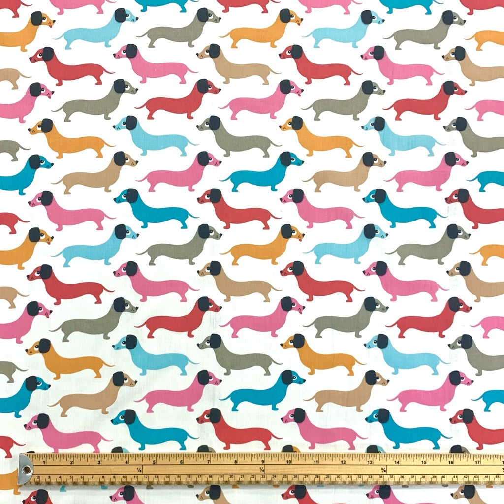 Multicoloured Sausage Dogs Polycotton Fabric - Pound Fabrics