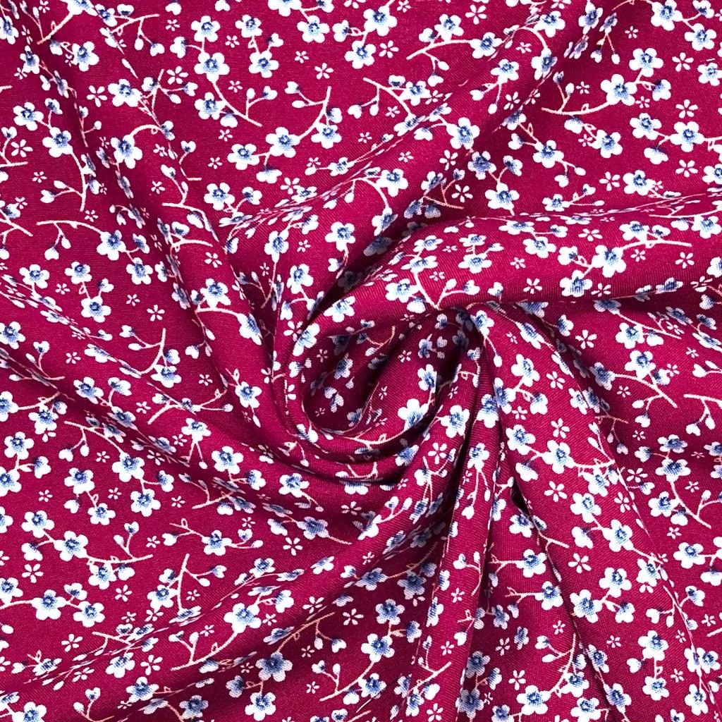 Tiny Blue Floral on Burgundy Viscose Challis Fabric - Pound Fabrics