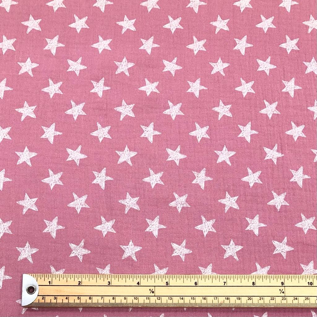 White Stars on Pink Double Gauze Fabric - Pound Fabrics