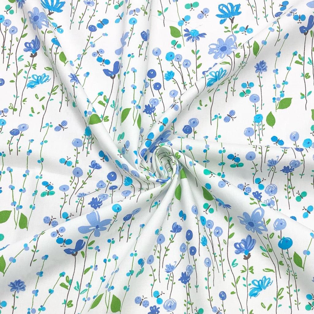 Spring Flower Garden on White Rose & Hubble Cotton Poplin Fabric - Pound Fabrics