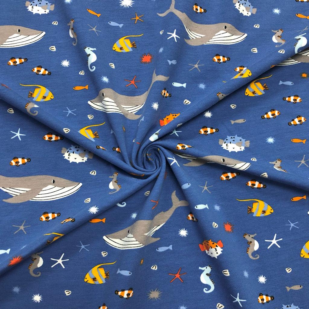 All Over Sea Animals on Blue Cotton Jersey Fabric - Pound Fabrics