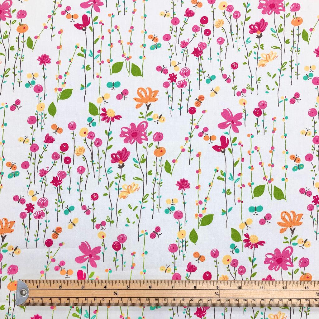 Spring Flower Garden on White Rose & Hubble Cotton Poplin Fabric - Pound Fabrics