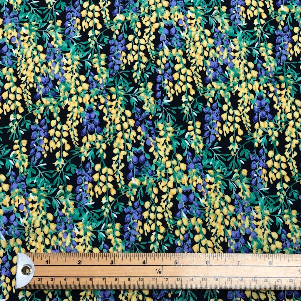 All Over Yellow/Purple Floral Branches on Black Polyester Crepe Fabric - Pound Fabrics