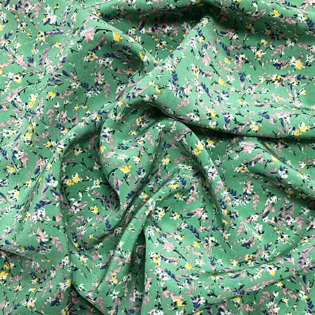 Mini Floral Bunch on Green Polyester Crepe Fabric - Pound Fabrics
