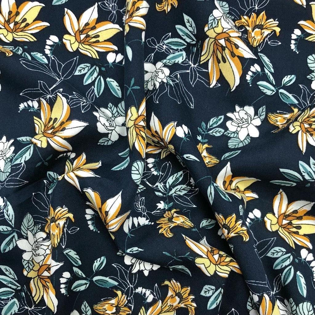 Lilies and Delicate Leaves Viscose Challis Fabric - Pound Fabrics