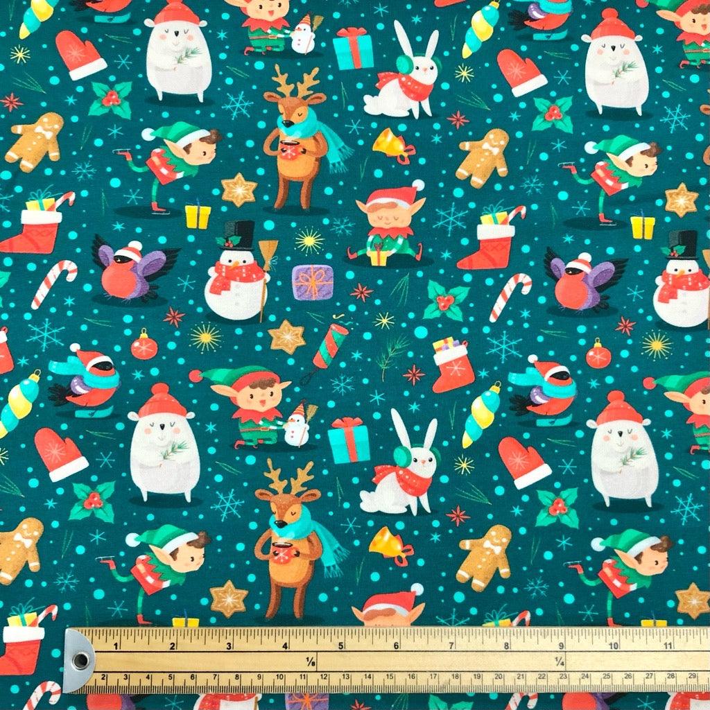 Christmas Motif on Teal French Terry Fabric - Pound Fabrics