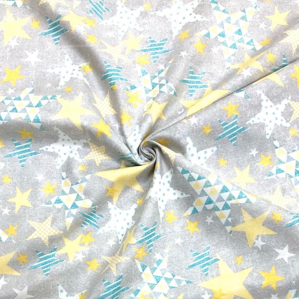 White/Yellow/Blue Stars on Grey Cotton Fabric - Pound Fabrics