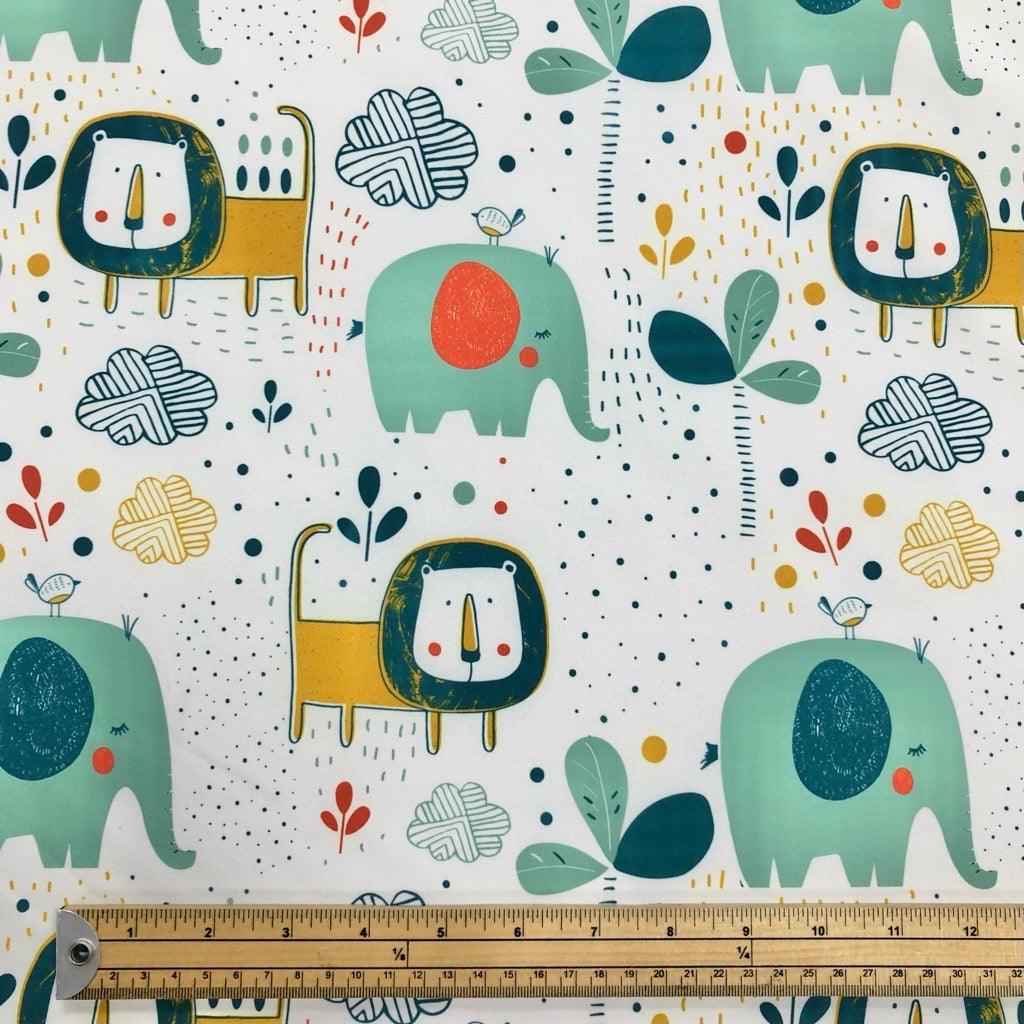 Lions and Elephants on White Softshell Fabric - Pound Fabrics