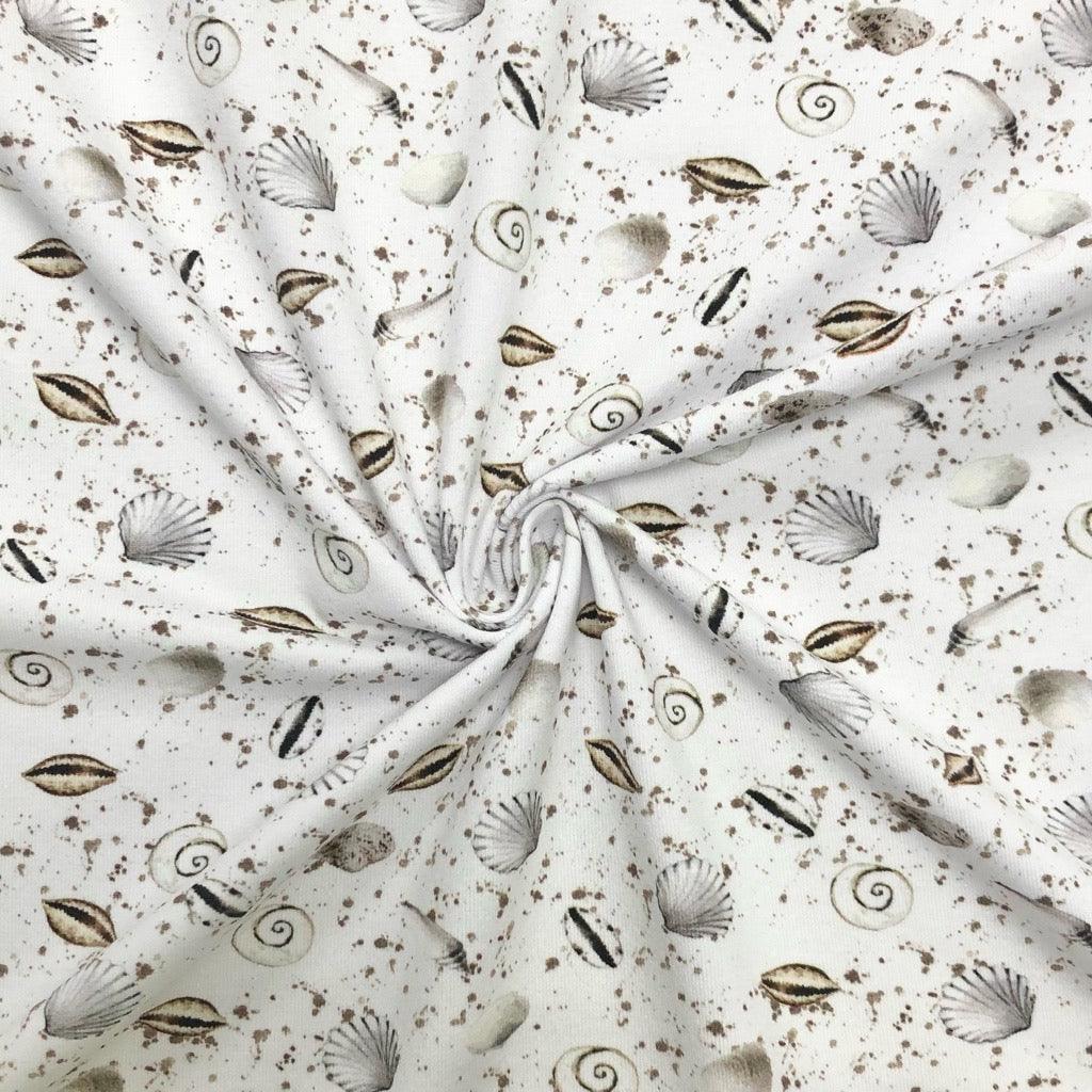 Sea Shells on White Cotton Jersey Fabric - Pound Fabrics