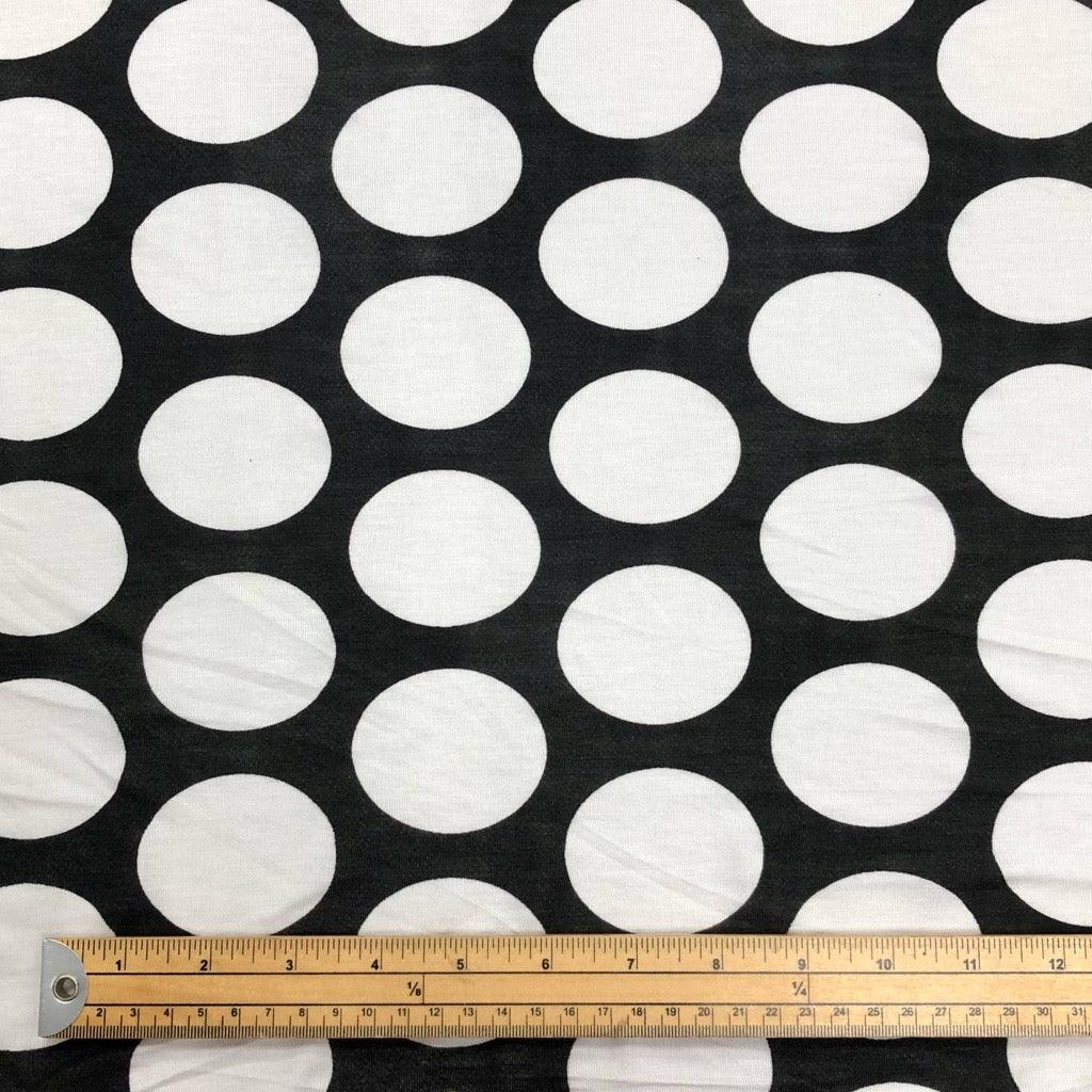 Large White Dots on Black Viscose Knit Fabric - Pound Fabrics