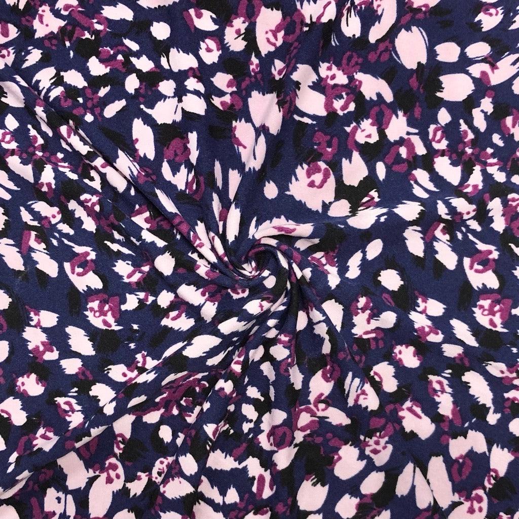 Pink and Black Patterns on Navy Brushed Soft Jersey Fabric - Pound Fabrics