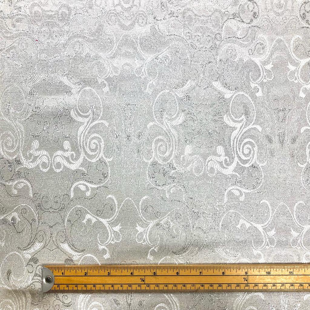 Symmetrical Patterns on Silver Brocade Fabric - Pound Fabrics