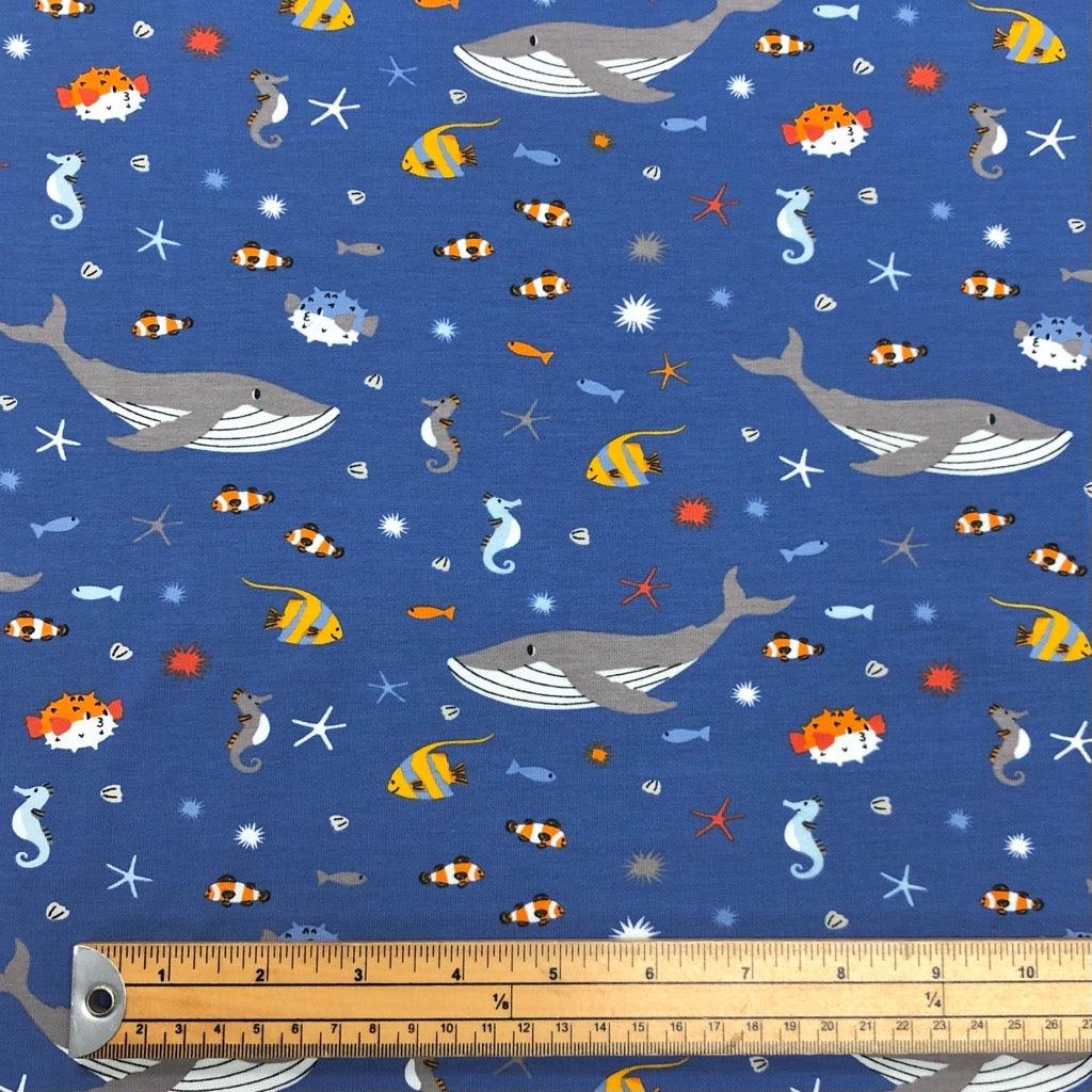 All Over Sea Animals on Blue Cotton Jersey Fabric - Pound Fabrics