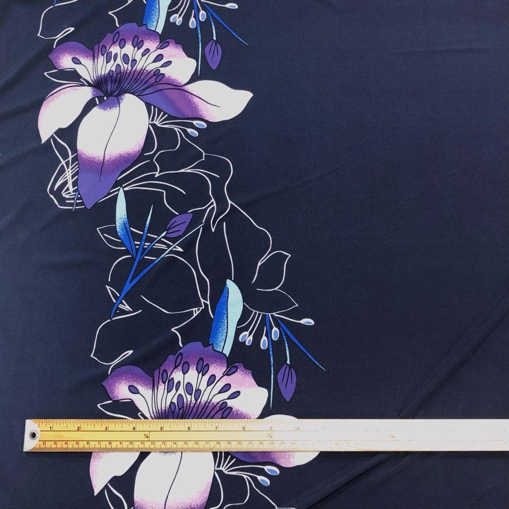 Purple and Blue Floral Border on Navy Elastane Fabric - Pound Fabrics