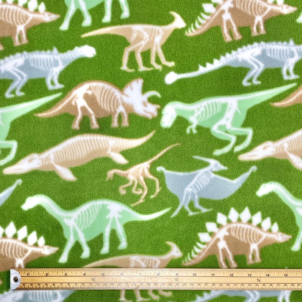 Dino Skeletons on Green Anti Pill Polar Fleece Fabric