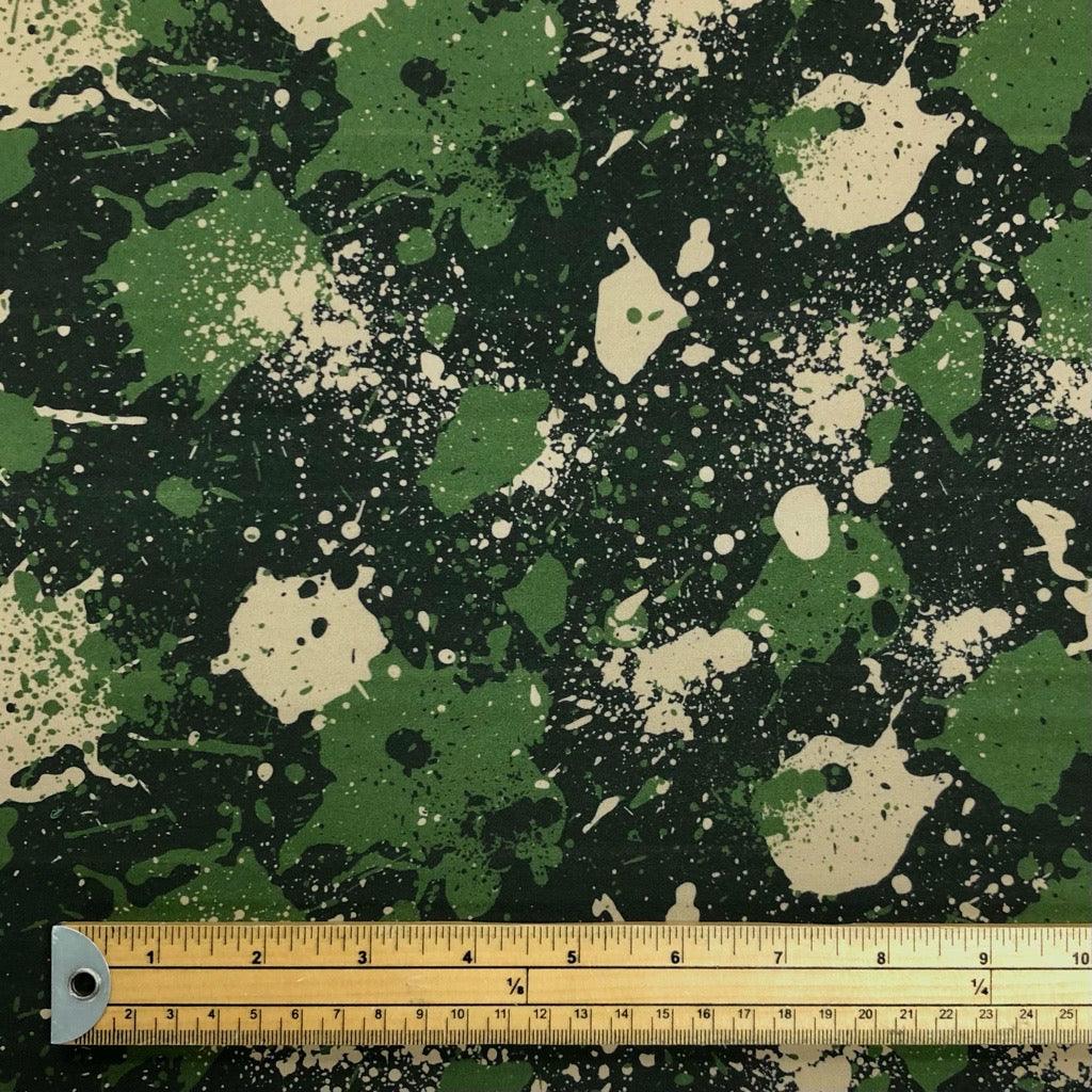 Green and Beige Paint Splatters Softshell Fabric - Pound Fabrics