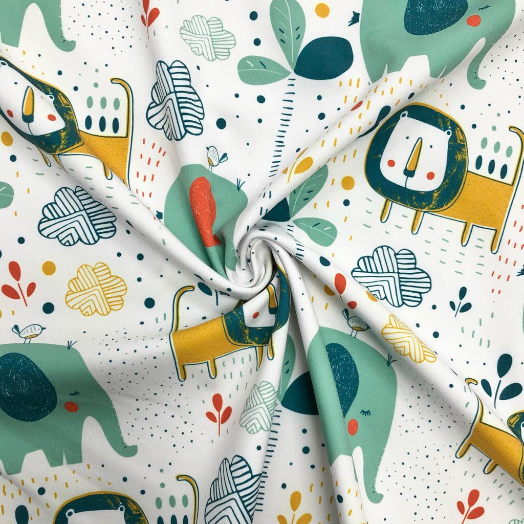 Lions and Elephants on White Softshell Fabric - Pound Fabrics