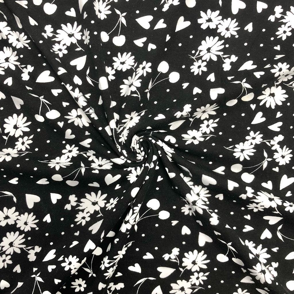 White Floral and Cherries on Black Cotton Jersey Fabric - Pound Fabrics